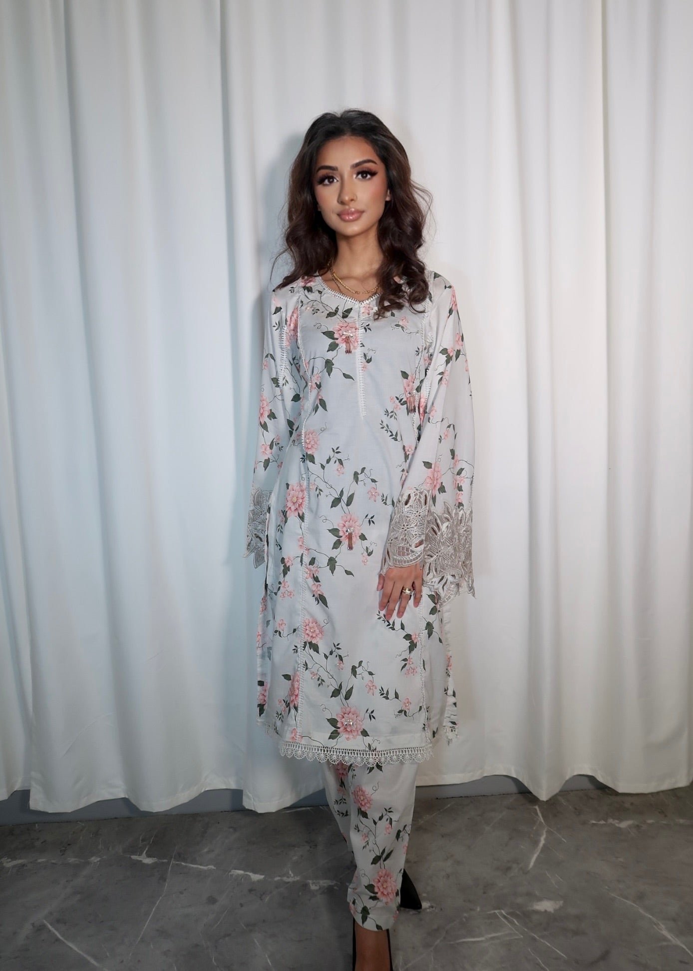 FLORAL 2 PIECE SUIT WITH POTLI BAG