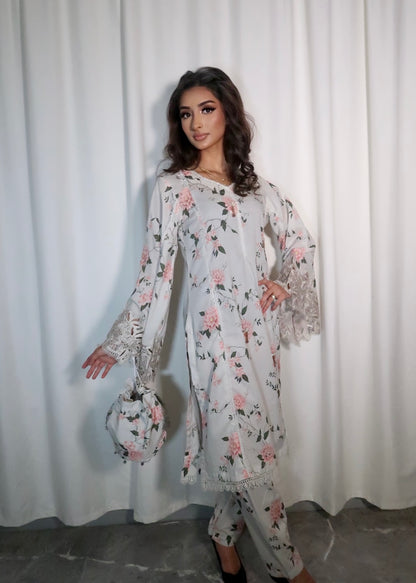 FLORAL 2 PIECE SUIT WITH POTLI BAG